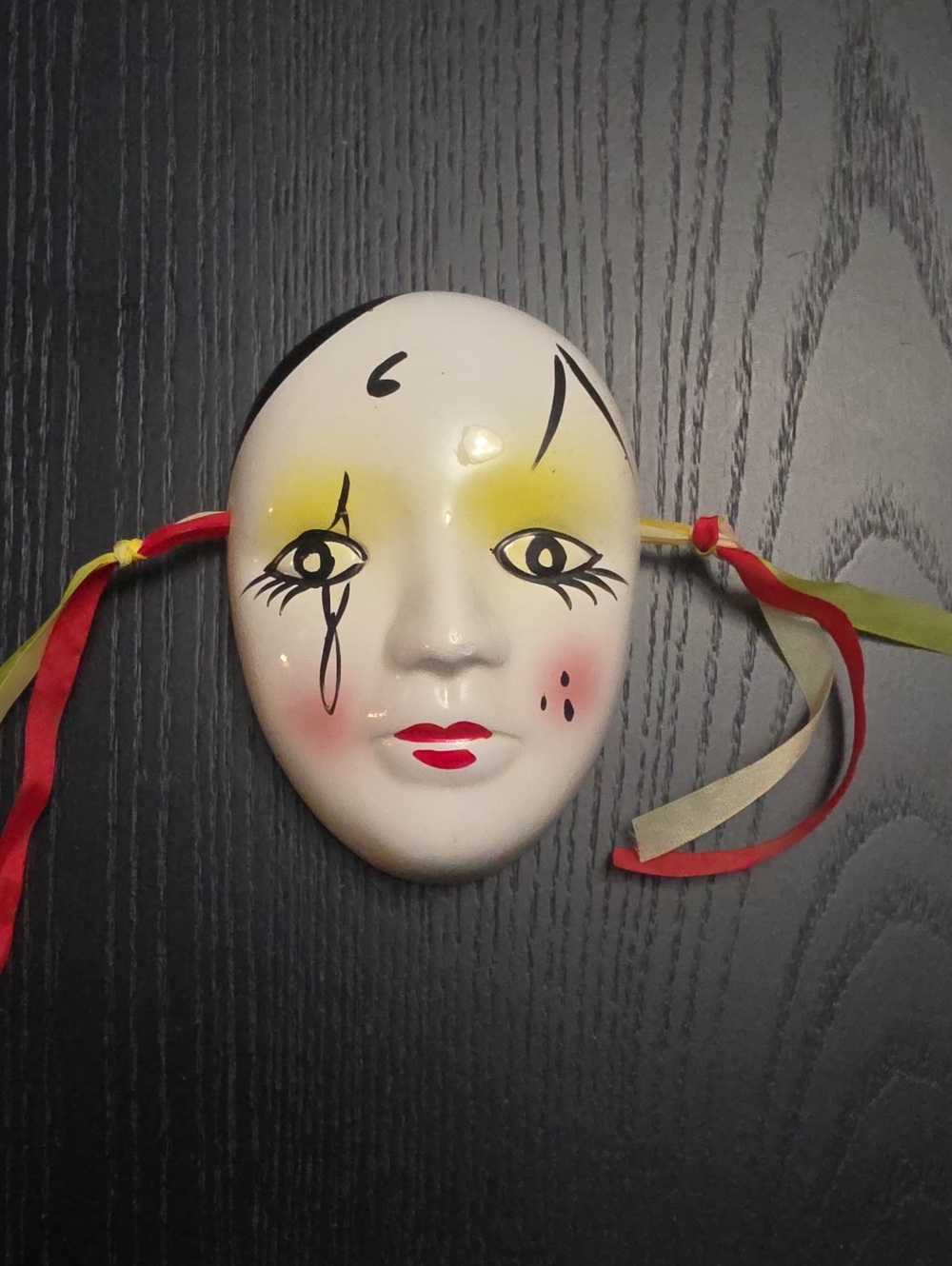 Porcelain Decorative Harlequin Mask with Red and Yellow Ribbon